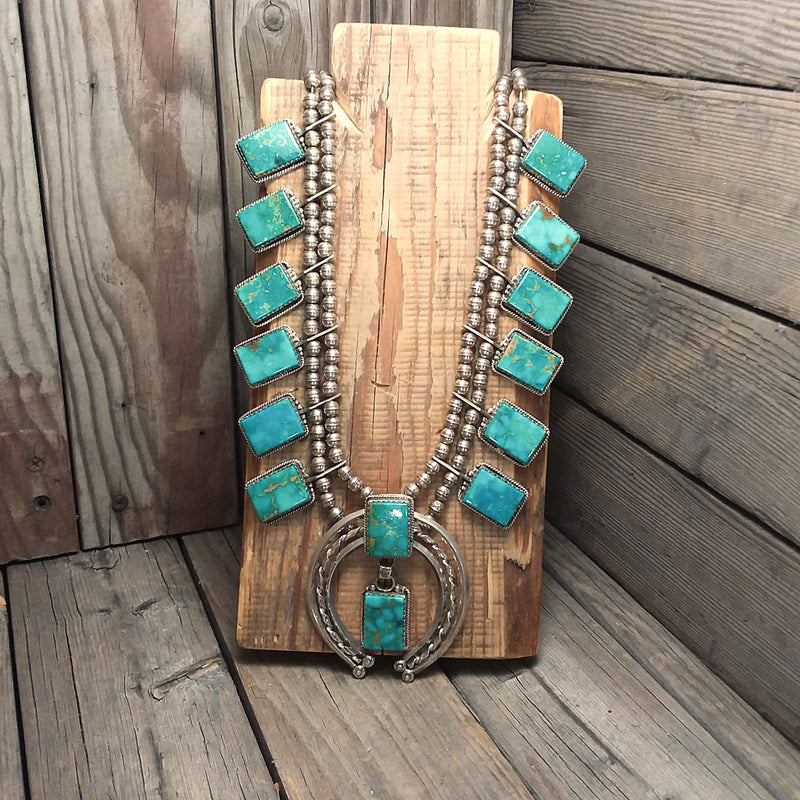 Nita Edsity Navajo turquoise sterling silver squash blossom necklace.