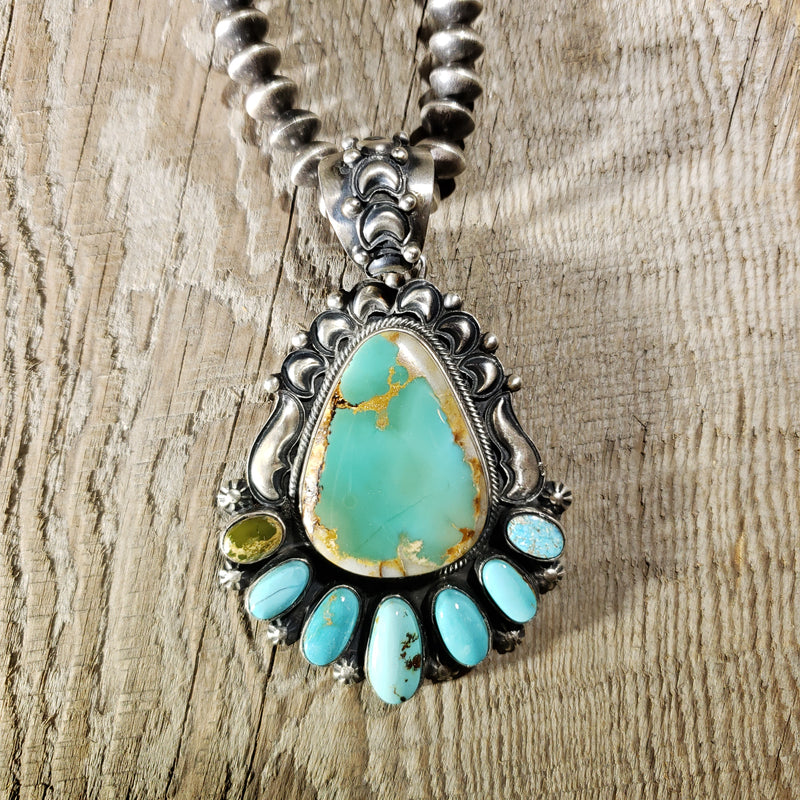 Turquoise/Spiney Oyster Pendant By Ervin Tsosie