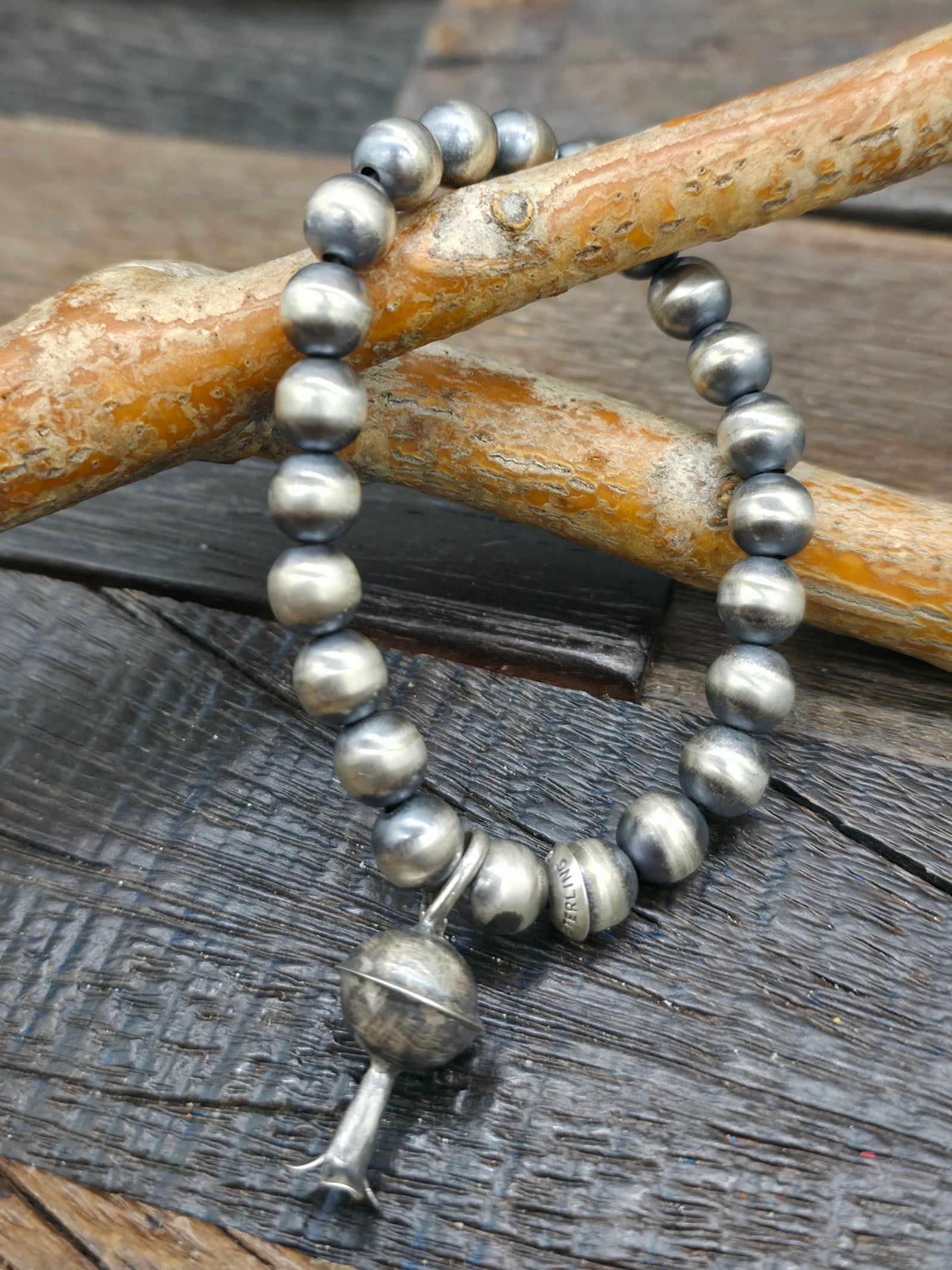 Stretch Oxidized Sterling Silver Bead Bracelet by Bryannen Halwood with Squash Blossom Charm- 6 in 8 mm.