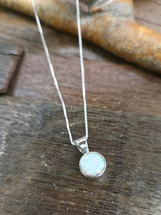 Sterling Silver White Lab Opal Pendant on 18 in. Chain - Round