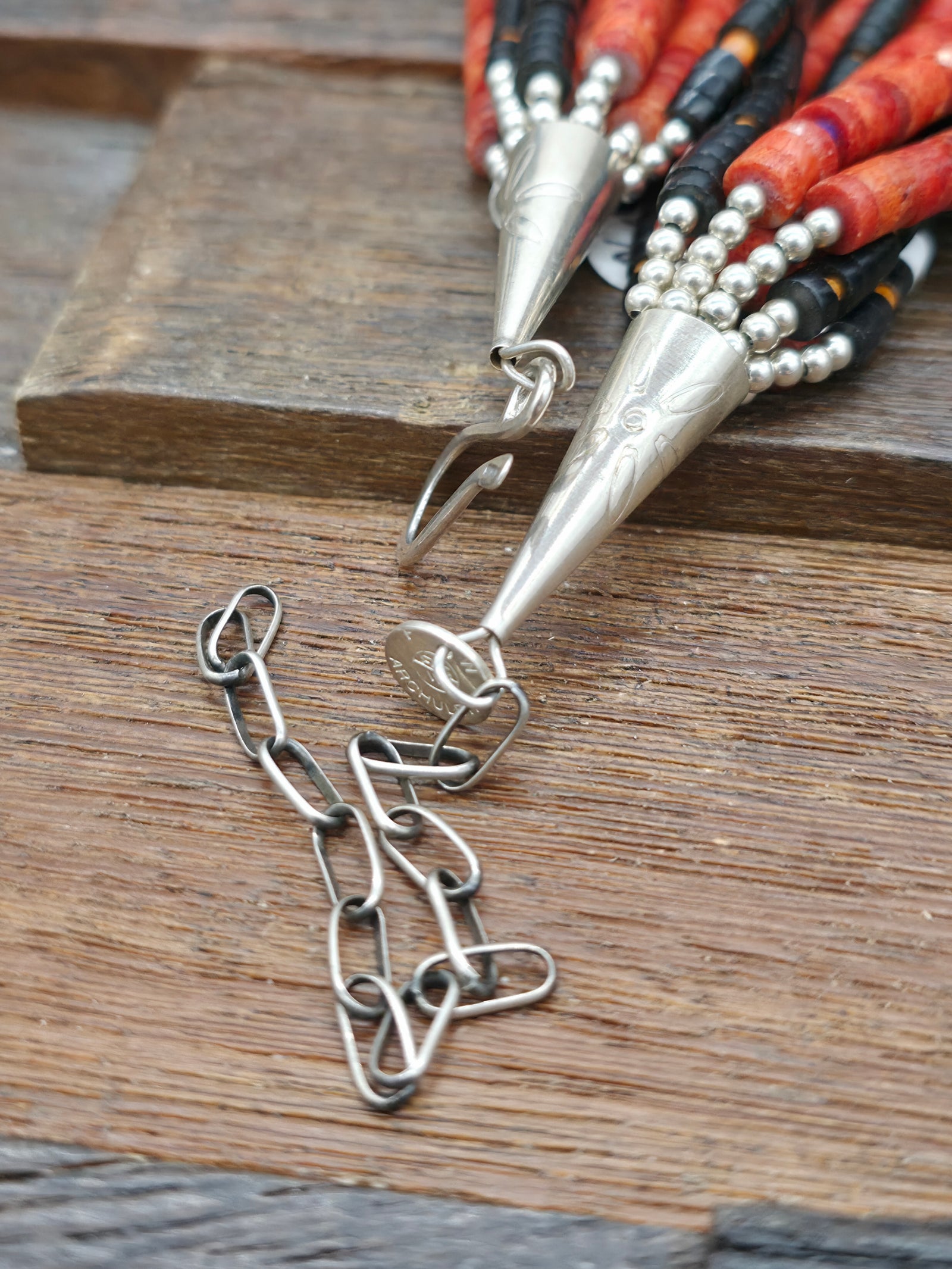 10 Strand Jet, Apple Coral, and Lapis Heishi Necklace by Fred Archuleta -  22 in. w/4 in. Extender