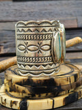 Wide Stamped Sterling Silver and Blue Gem Ribbon Turquoise Cuff by Delbert Delgarito