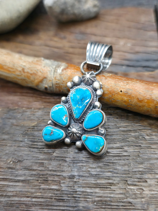 Sterling Silver Blue Gem Turquoise Half Cluster Pendant by LaRose Ganadanegro - 2 in. by 1 in.