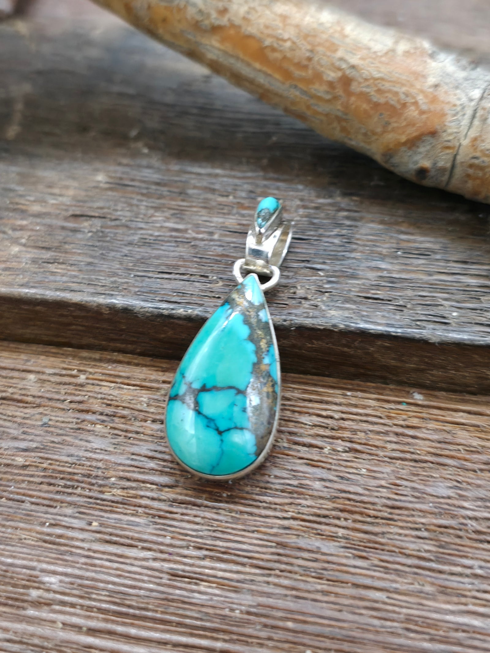 Sterling Silver Green Turquoise Teardrop Pendant by Calvin Martinez - 1 1/4 in. by 1/2 in.