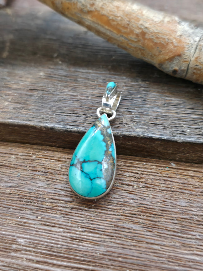 Sterling Silver Green Turquoise Teardrop Pendant by Calvin Martinez - 1 1/4 in. by 1/2 in.