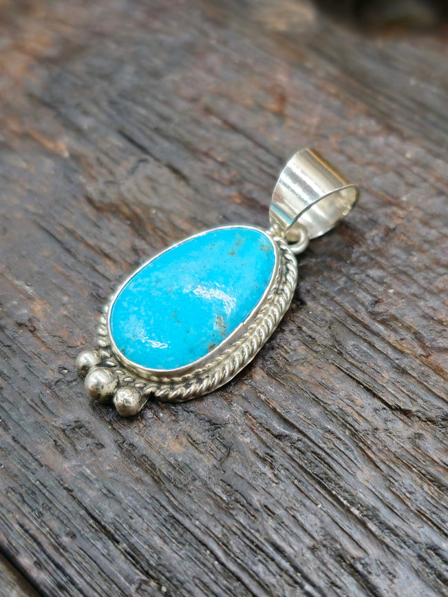 Sterling Silver and Blue Turquoise Pendant by Byron Begay