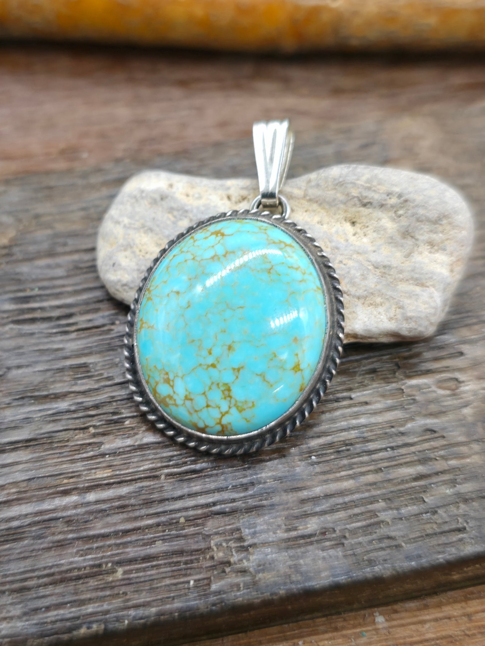 Sterling Silver Blue Turquoise Oval Pendant - 1 1/2 in. by 3/4 in.