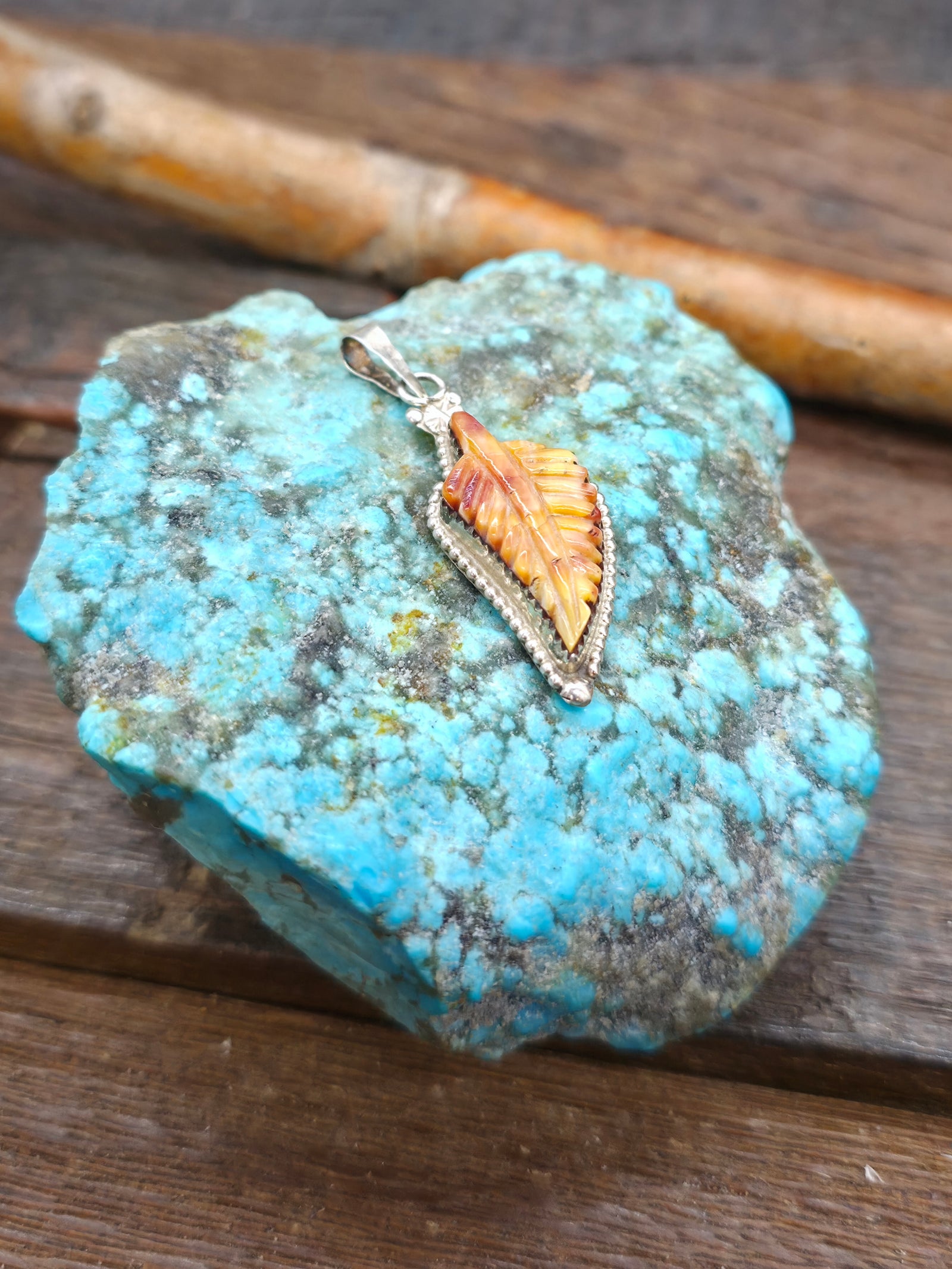 Sterling Silver Carved Orange Spiny Oyster Leaf Pendant - 1 1/2 in. by 1/2 in.