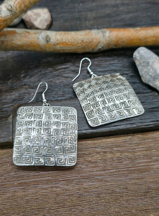 Stamped Sterling Silver Earrings by Shamenika Nelson