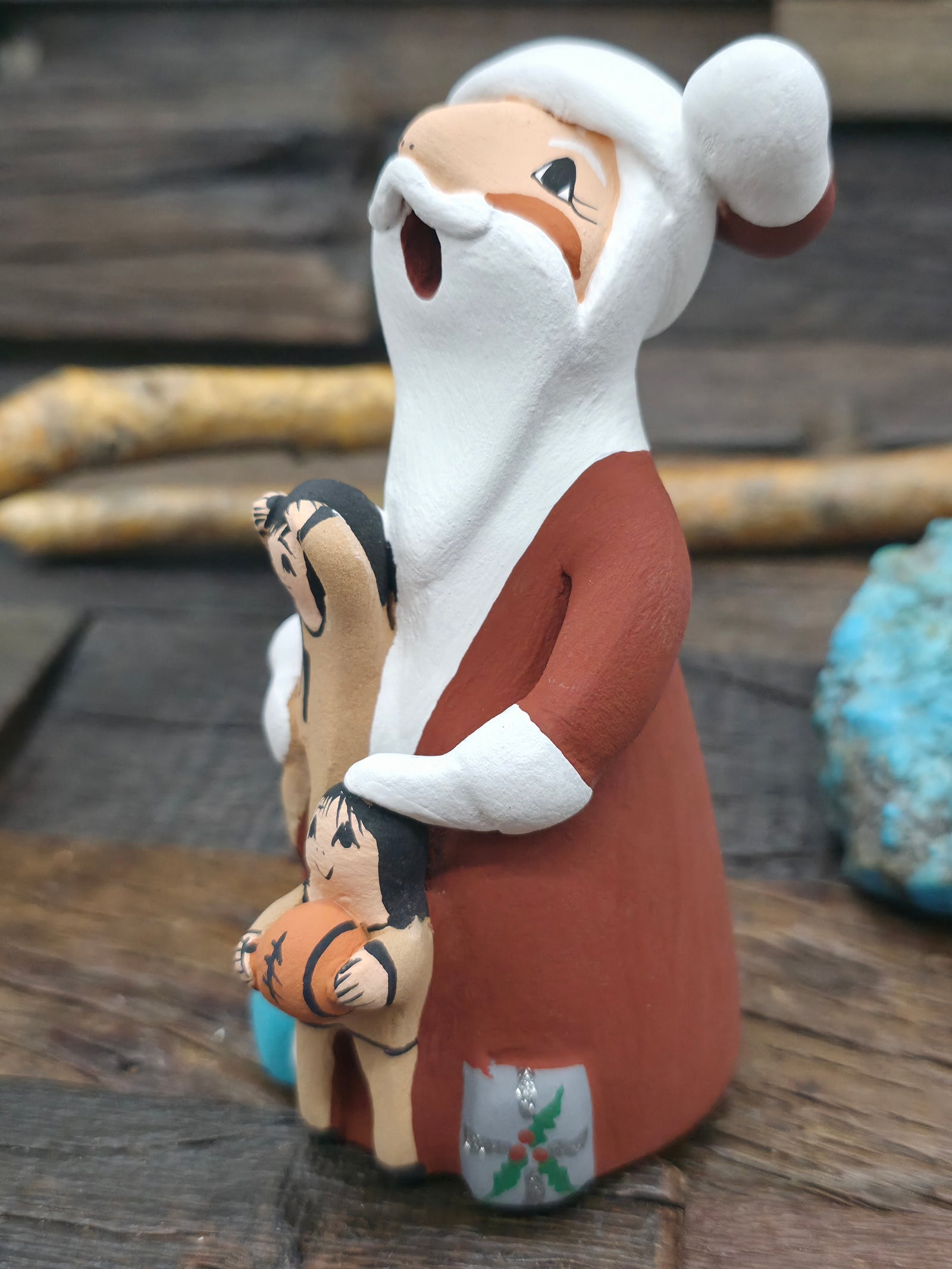 Standing Santa Claus Jemez Storyteller Figurine by D. Lucero - 5 in. by 2 1/2 in. by 2 1/2 in.