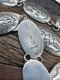 Stamped Sterling Silver Link Belt with Wild Horse Buckle by Thomas Nez - 42 in.