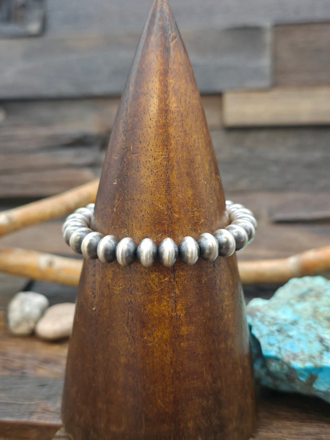 Stretch Oxidized Sterling Silver Saucer Bead Bracelet by Bryannen Halwood - 6 in 10 mm
