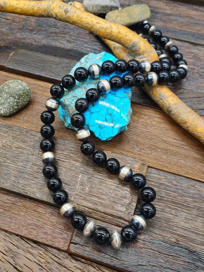 Black Onyx and Sterling Silver bead Necklace by Fred Archuleta - 32 in.