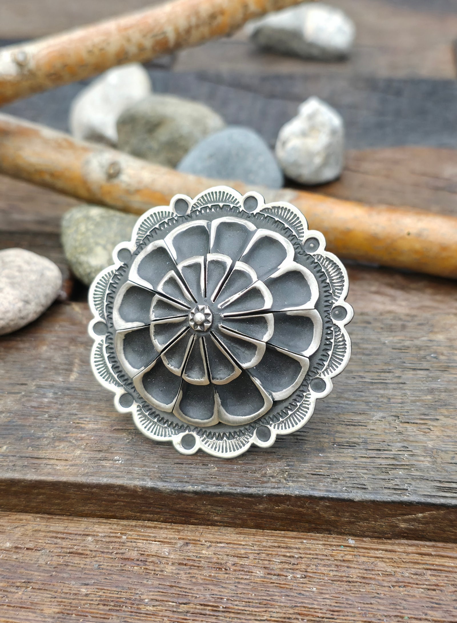 Adjustable Round Stamped Sterling Silver Ring by Leander Tahe