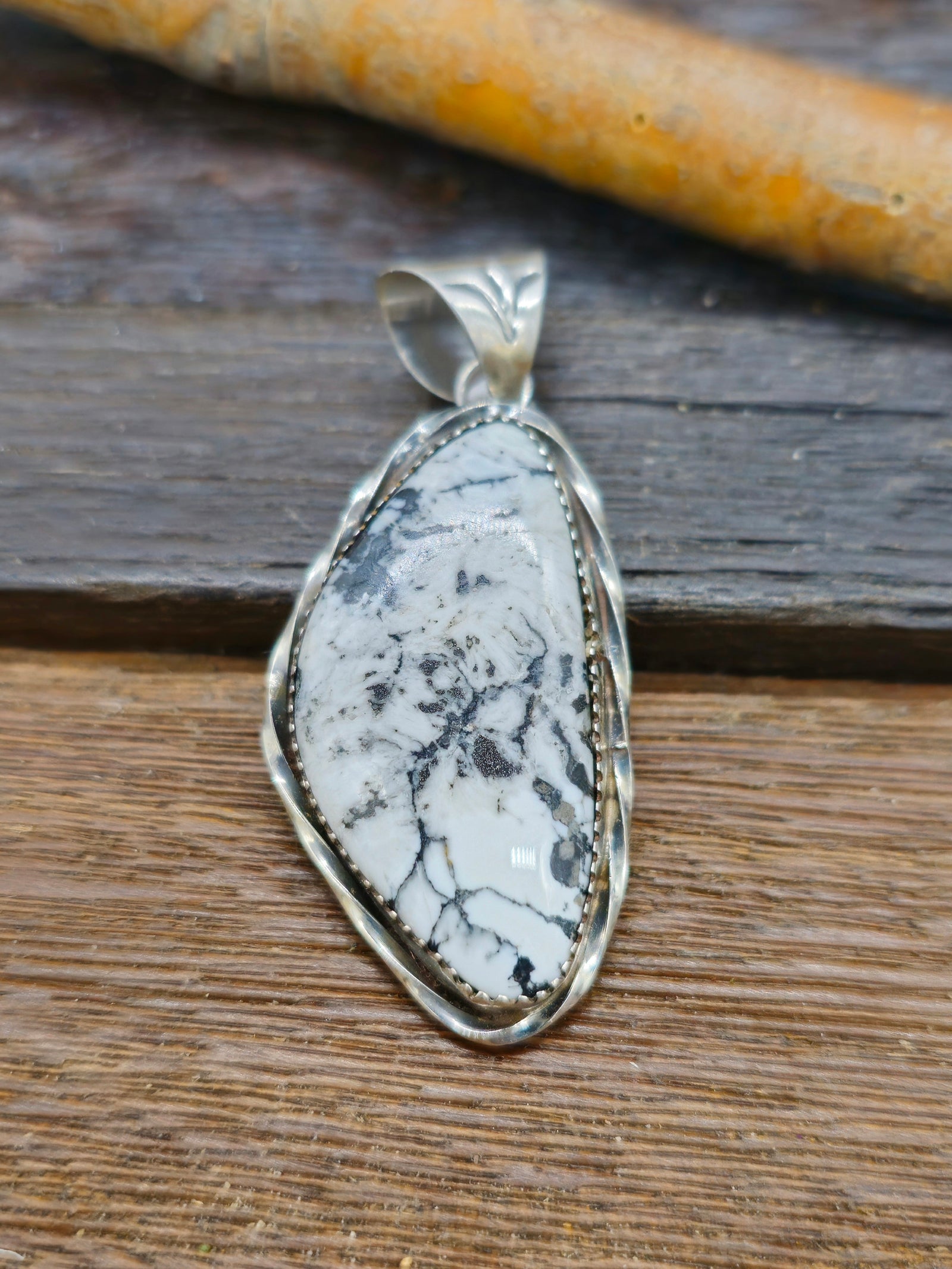 Sterling Silver White Buffalo Pendant with Stamped Bail
