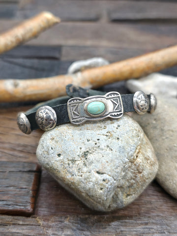 Black Leather Bracelet with Circular Sterling Silver Conchos and Single Rectangular Blue Turquoise Concho by Rick Montaño - 8 in. - Designs Vary