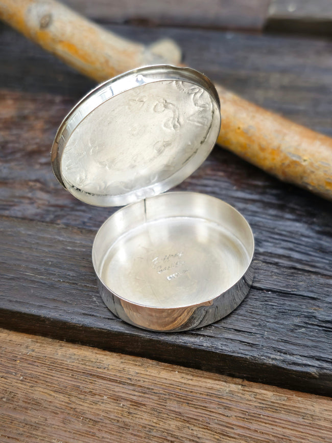 Stamped Sterling Silver Round Pill Case by Jeffrey Castillo