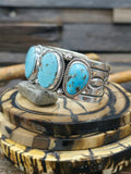 Stamped Sterling Silver and Kingman Turquoise Cuff by Delbert Delgarito  - 7 in.