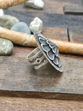 Adjustable Round Stamped Sterling Silver Ring by Leander Tahe
