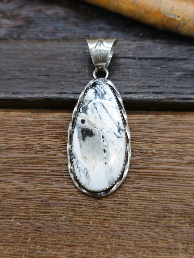 Sterling Silver White Buffalo Pendant with Stamped Bail