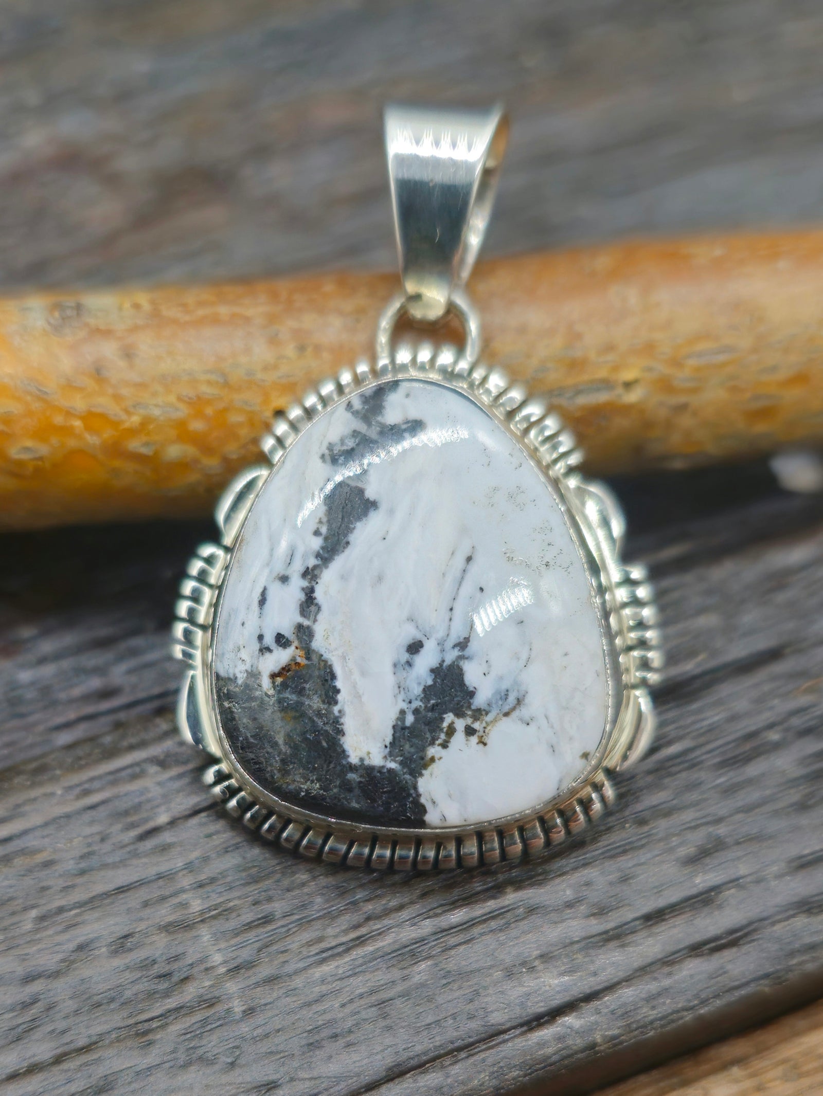Sterling Silver Triangle White Buffalo Pendant by L. Yazzie