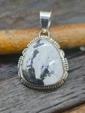 Sterling Silver Triangle White Buffalo Pendant by L. Yazzie