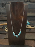 Sterling Silver, Carved Turquoise and Mother of Pearl Eagle Necklace by Ben Livingston - 21 in.