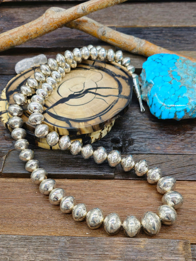 Stamped, Graduated High-Shine Navajo Pearl Necklace by Jeffrey Castillo - 29 in.