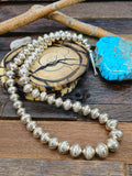 Stamped, Graduated High-Shine Navajo Pearl Necklace by Jeffrey Castillo - 29 in.