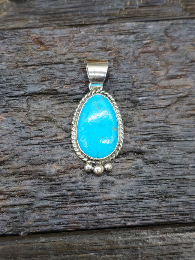 Sterling Silver and Blue Turquoise Pendant by Byron Begay