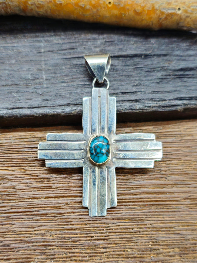 Zia Sterling Silver Pendant with Dark Blue Oval Turquoise Stone by Lucille Platero