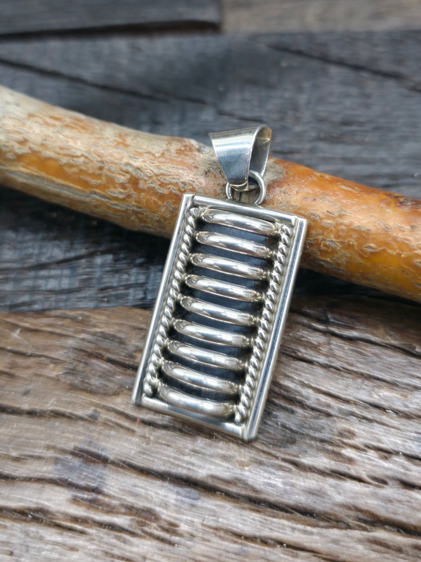 Sterling Silver Pendant by P.A. - Single Coil - 1 3/4 in. by 3/4 in.