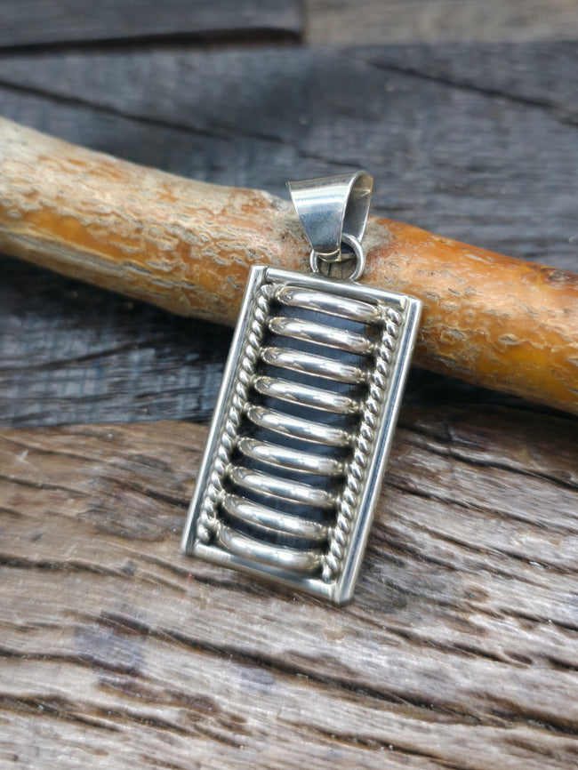 Sterling Silver Pendant by P.A. - Single Coil - 1 3/4 in. by 3/4 in.