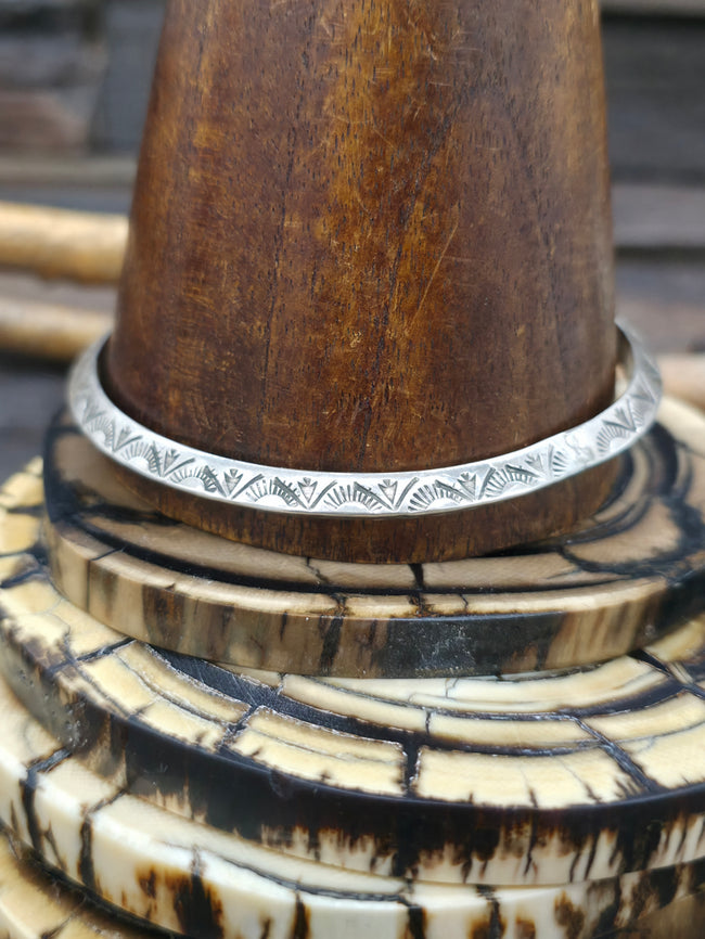 Stamped Sterling Silver Bangle by Wylie Secatero - Arrowheads Pattern - 9 in.