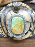 Turquoise Pendant with Stamped Sterling Silver by Leon Martinez