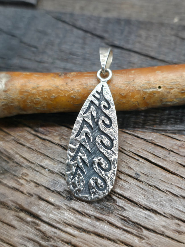Sterling Silver Hopi Overlay Corn Pendant by Ruben Saufkie - 2 in. by 5/8 in.