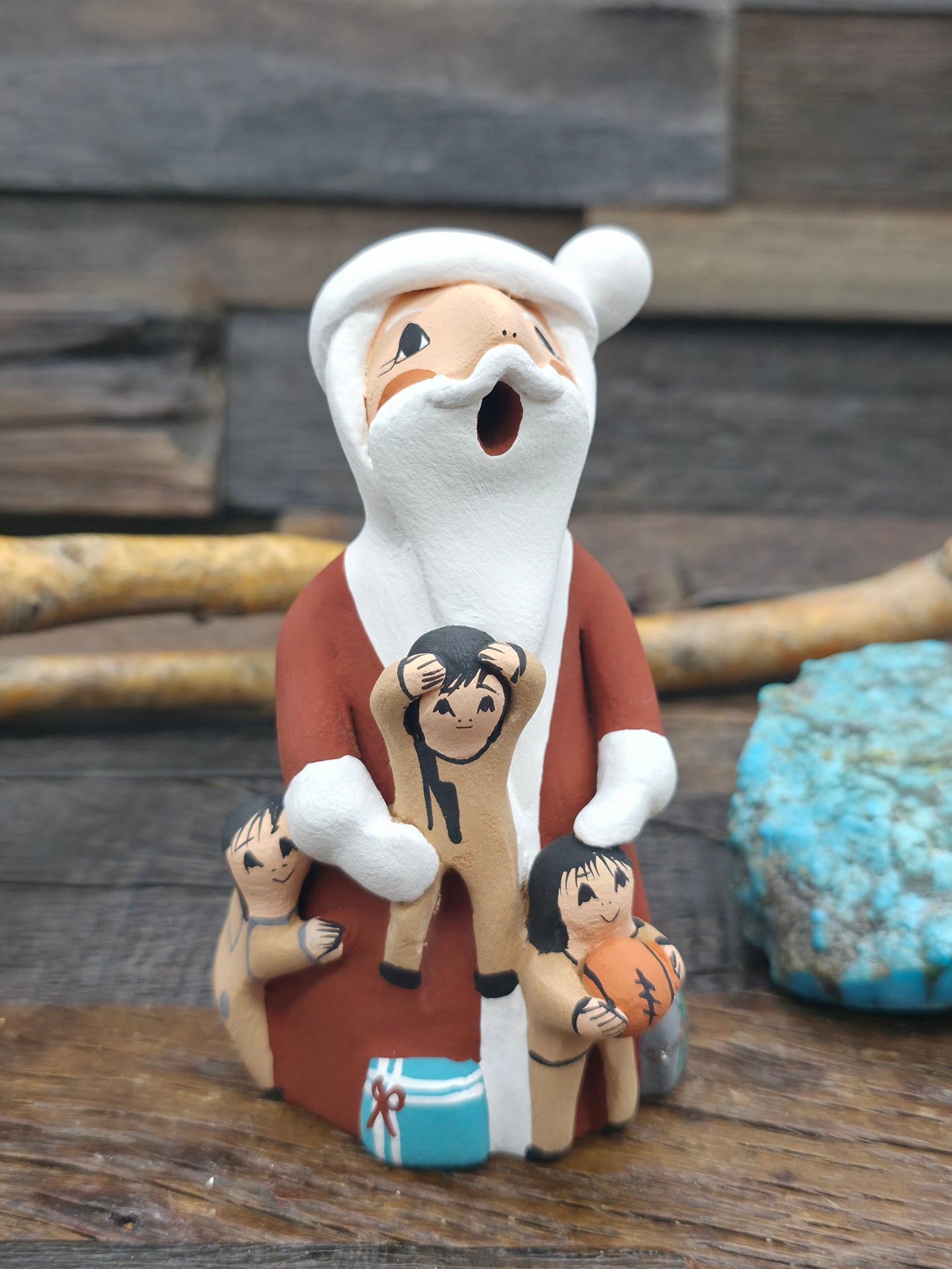 Standing Santa Claus Jemez Storyteller Figurine by D. Lucero - 5 in. by 2 1/2 in. by 2 1/2 in.