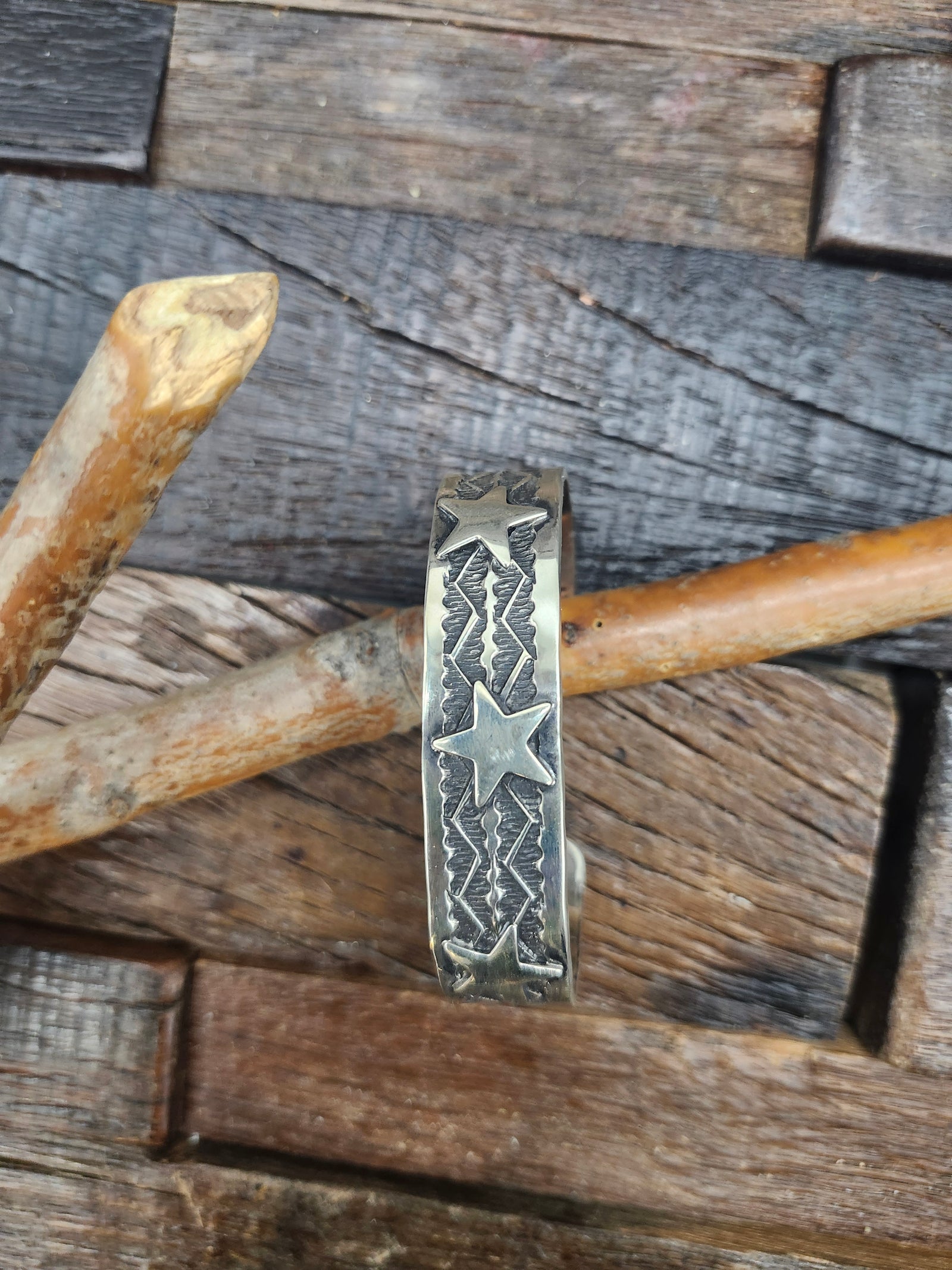 Sterling Stamped Star bracelet by Sunshine Reeves 6 134" w/ 1 1/4" opening