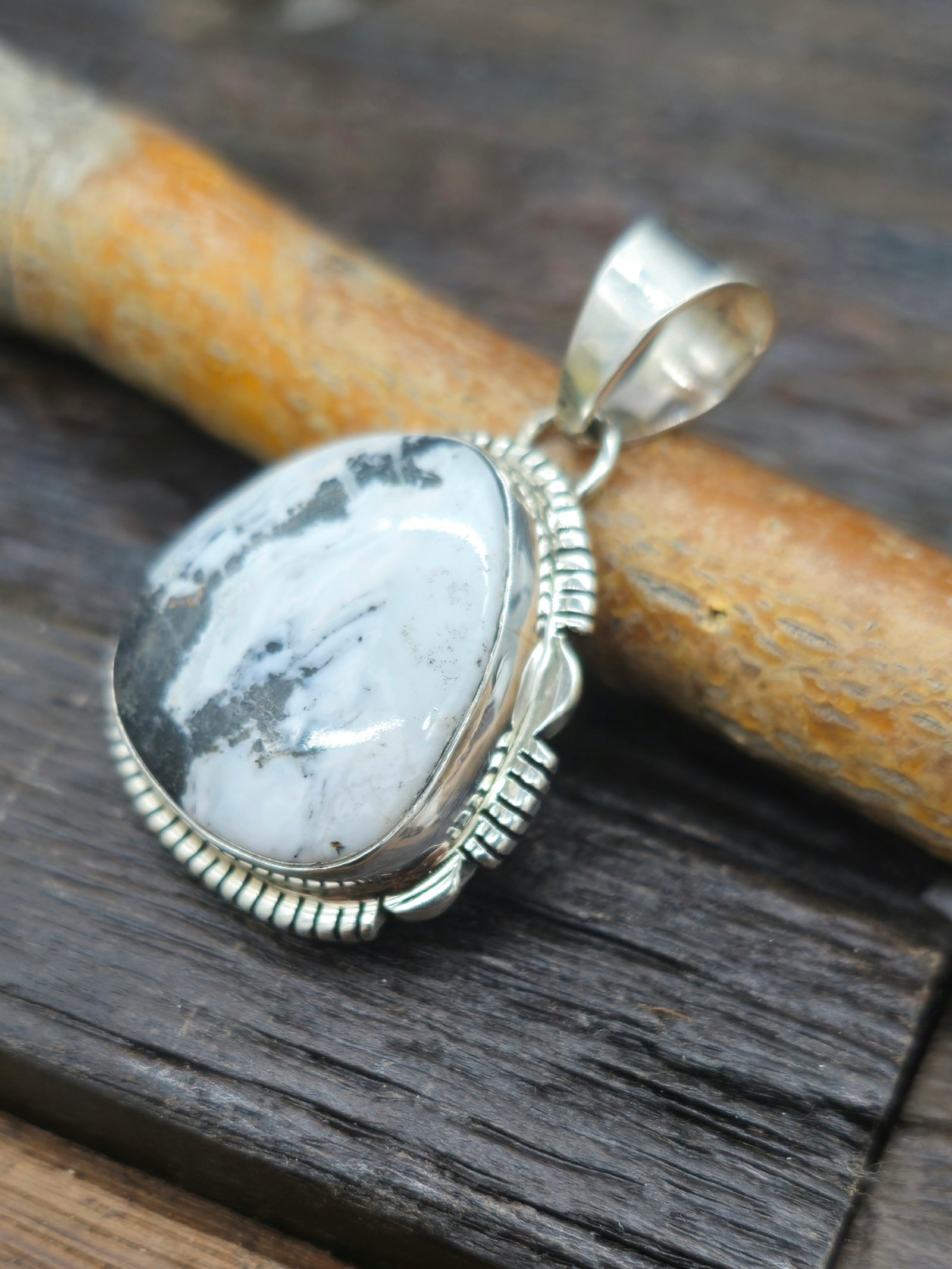 Sterling Silver Triangle White Buffalo Pendant by L. Yazzie