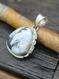 Sterling Silver Triangle White Buffalo Pendant by L. Yazzie