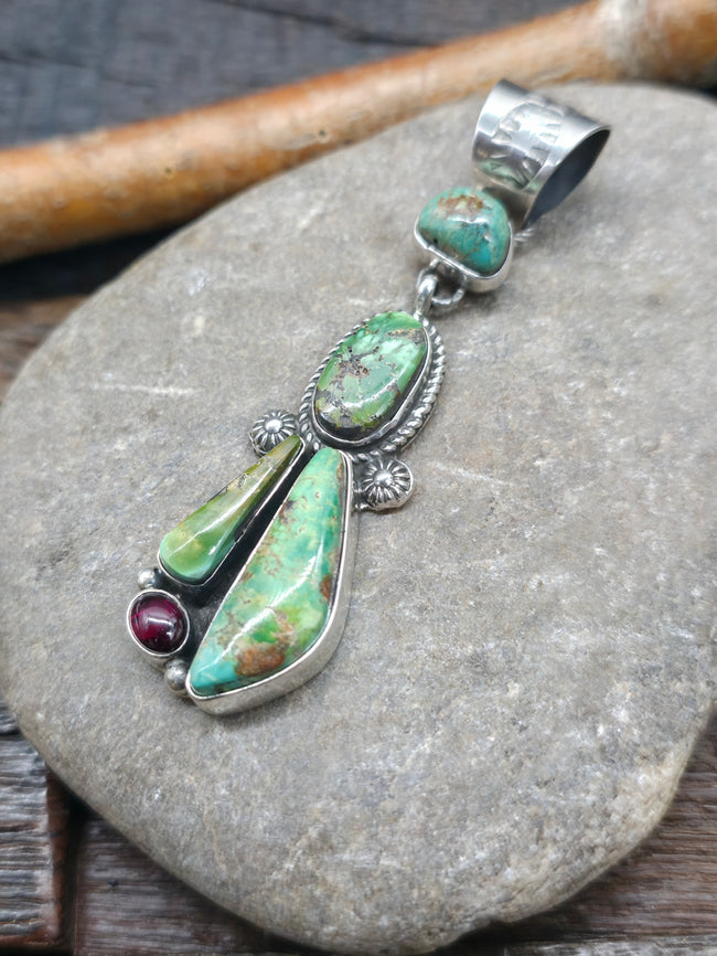 Royston Turquoise and Garnet Sterling Silver Pendant by Rosella Paxton - 3 in. by 7/8 in.