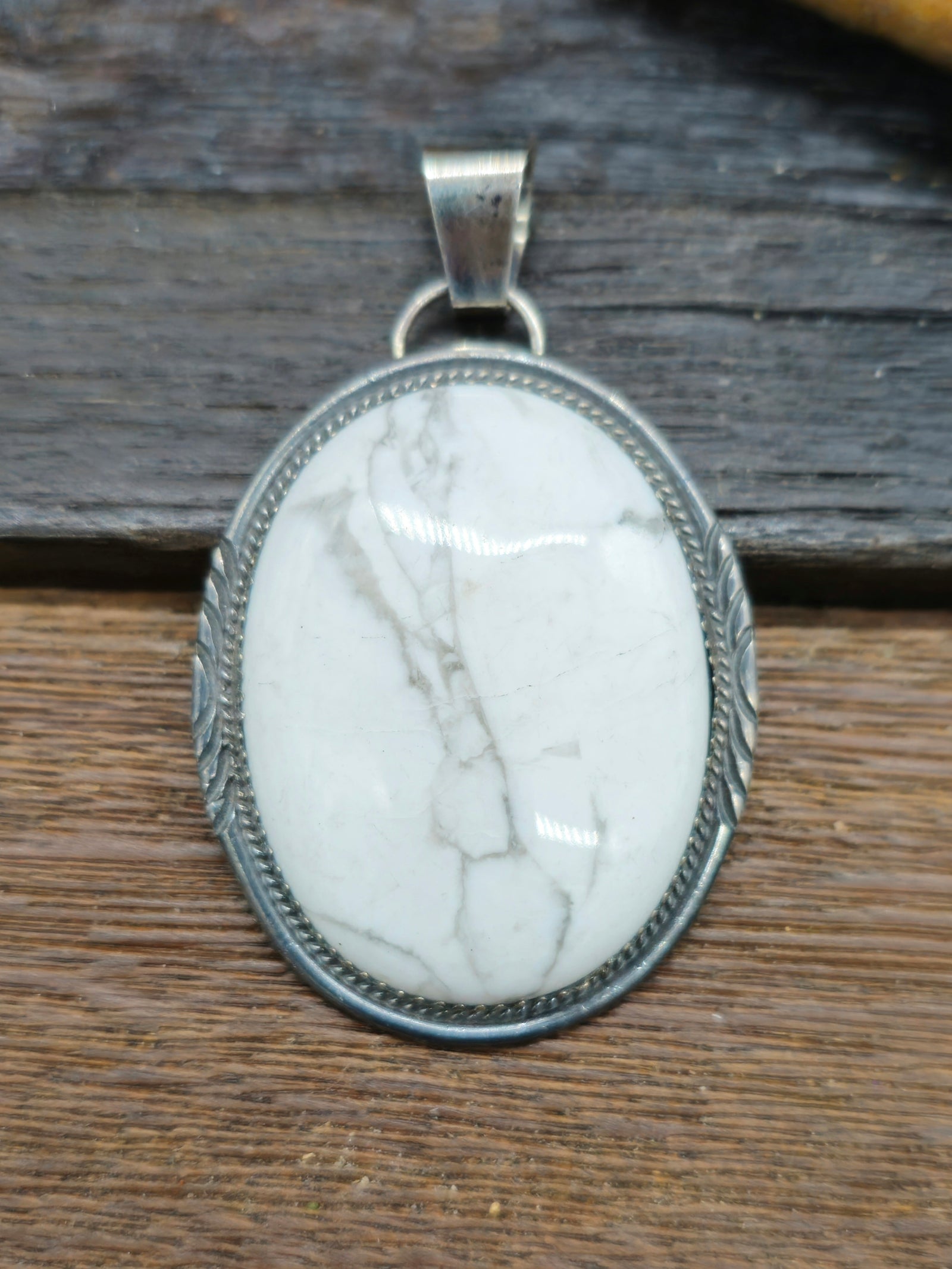 White Buffalo Sterling Silver Oval Pendant by Betty Begay