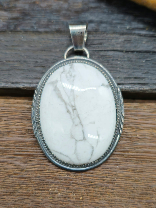 White Buffalo Sterling Silver Oval Pendant by Betty Begay