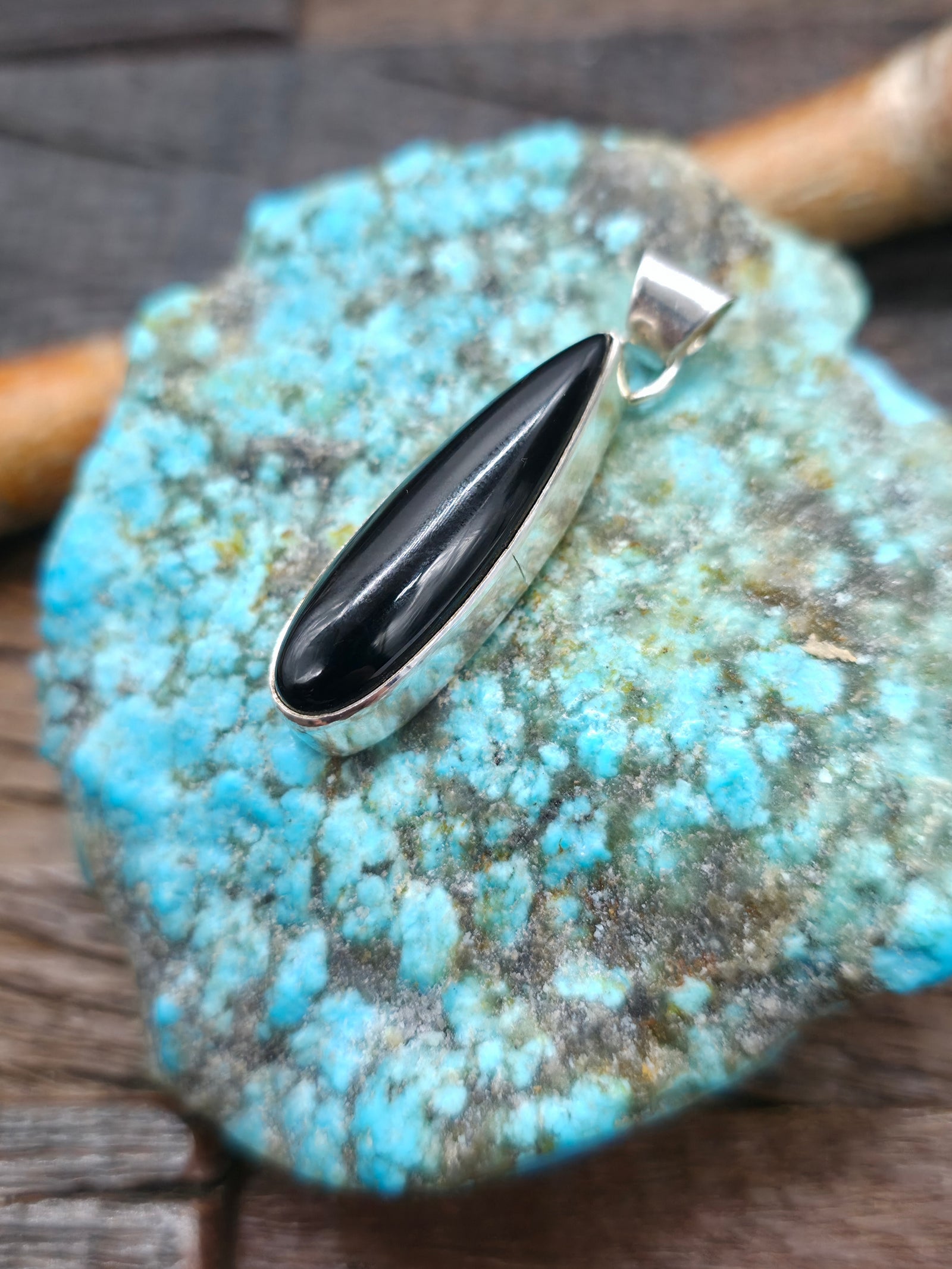 Onyx Sterling Silver Long Teardrop Pendant by Shirley Henry - 1 1/2 in by 3/8 in.