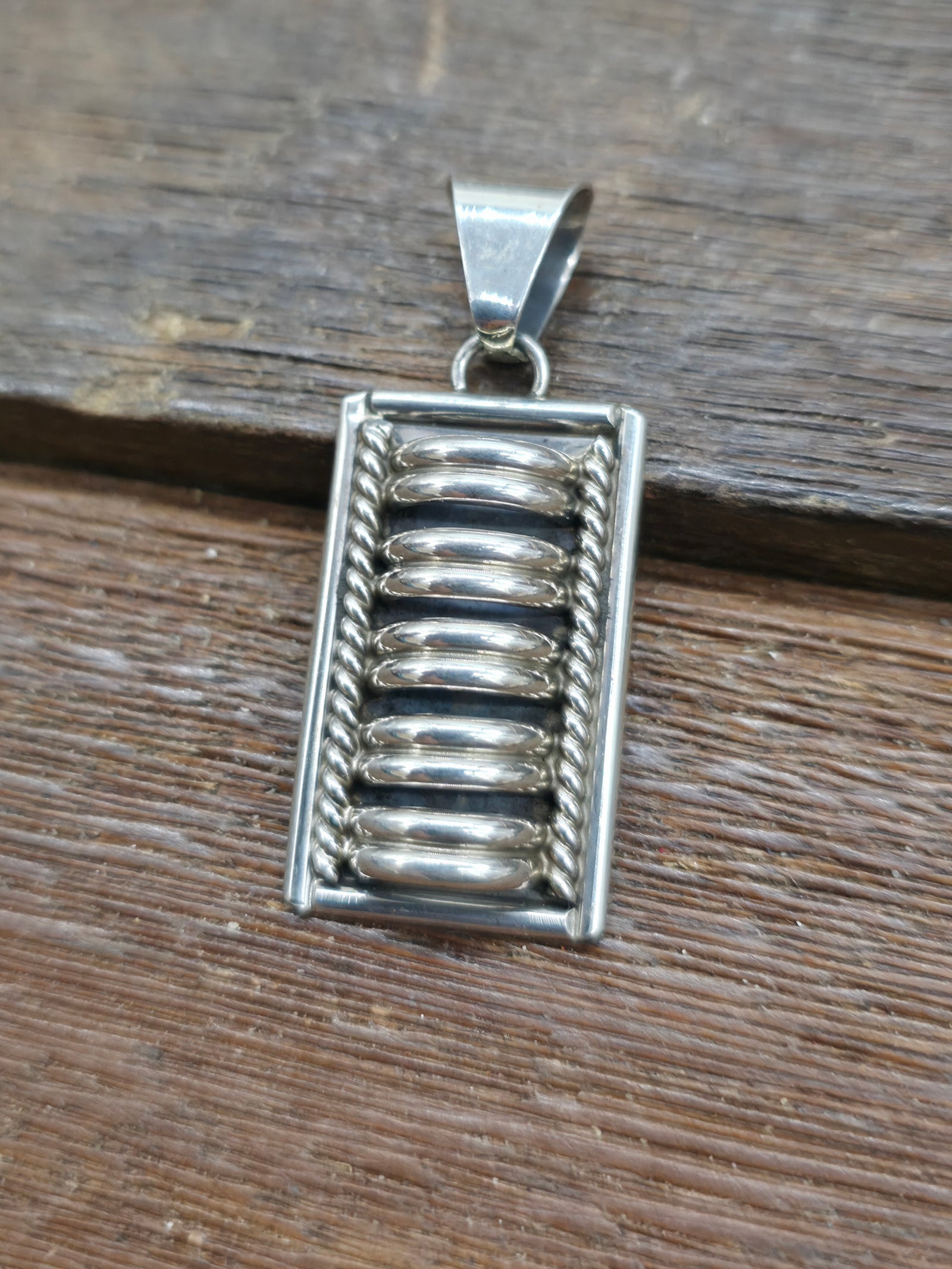 Sterling Silver Pendant by P.A. - Double Coil - 1 3/4 in. by 3/4 in.