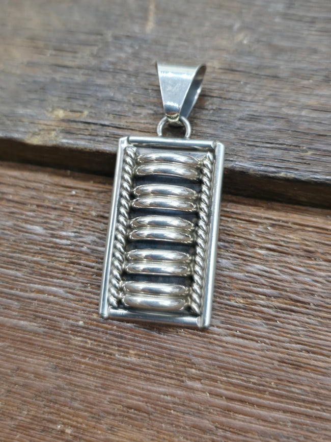 Sterling Silver Pendant by P.A. - Double Coil - 1 3/4 in. by 3/4 in.