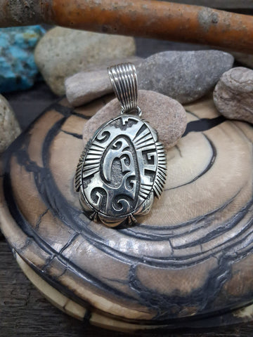 Double Heart Conch Sterling Silver Pendant by Robert Chakey