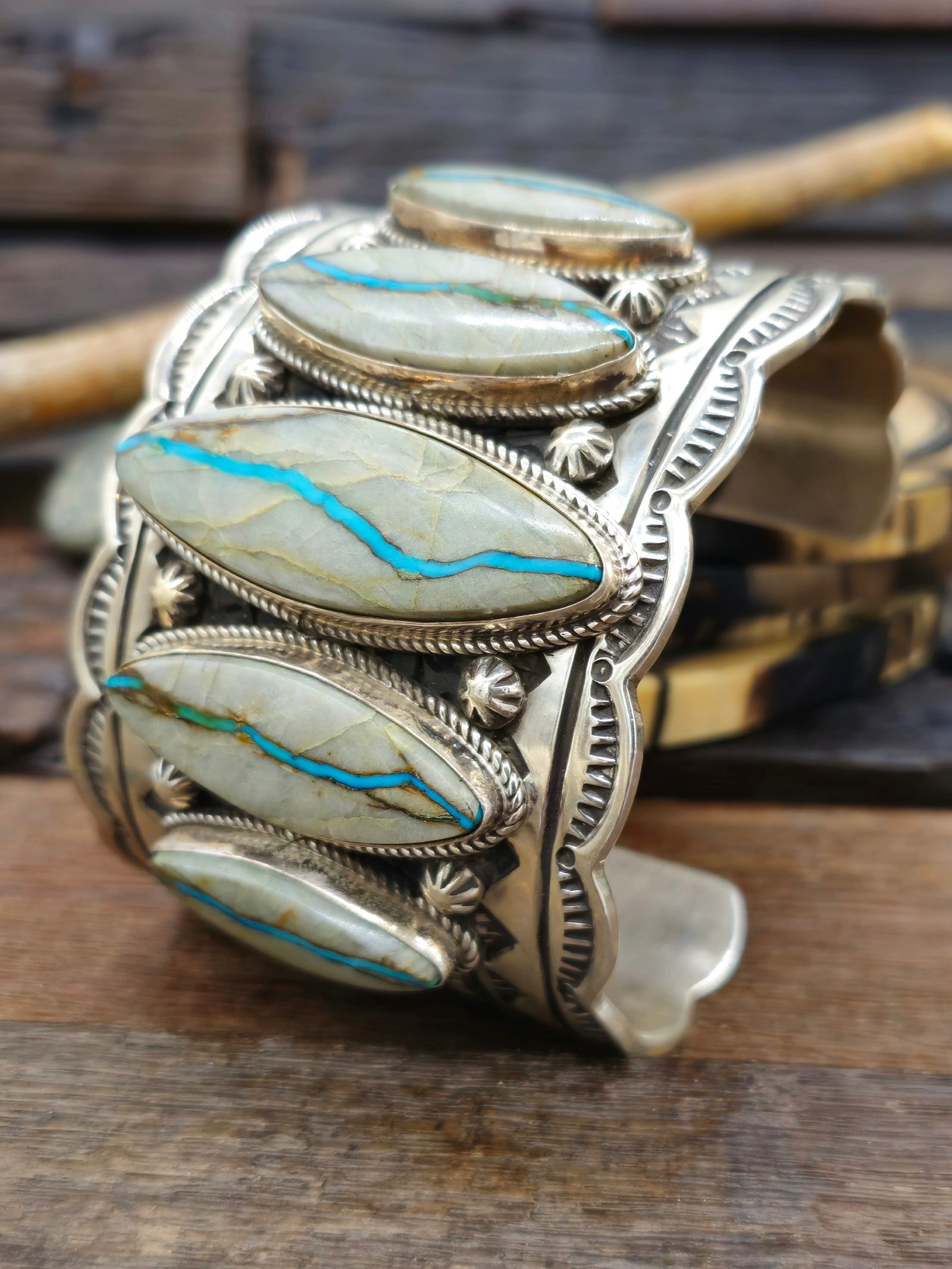 Wide Stamped Sterling Silver and Blue Gem Ribbon Turquoise Cuff by Delbert Delgarito