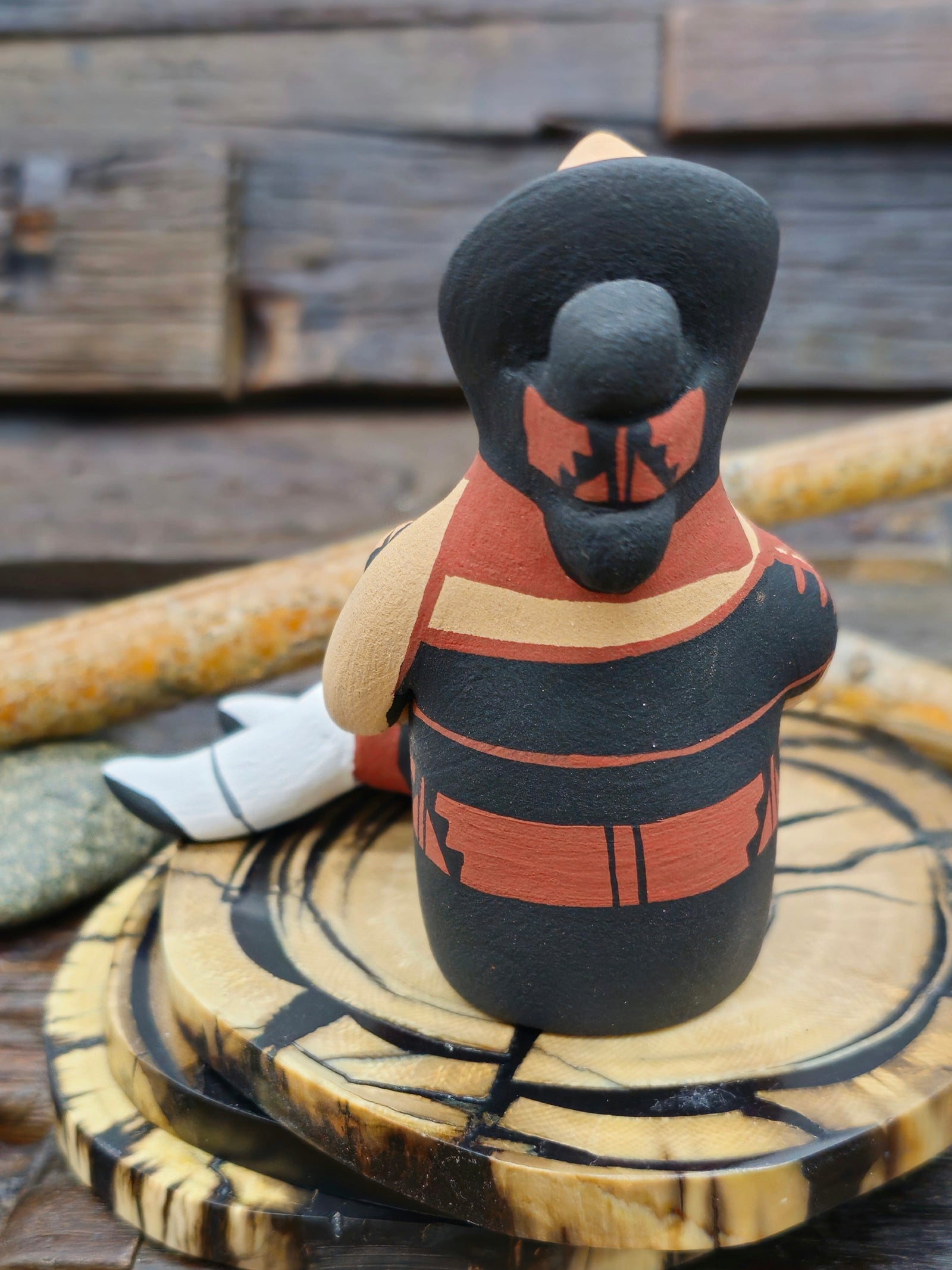 Jemez Storyteller Figurine with Two Children and Basket, made by D. Lucero - 3 1/4" by 3 1/4" by 2 1/2"