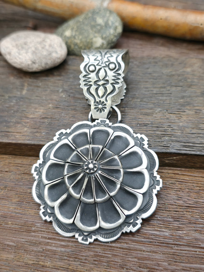 Stamped Sterling Silver Pendant with Round Center by Leander Tahe - 4 in. by 2 1/2 in.
